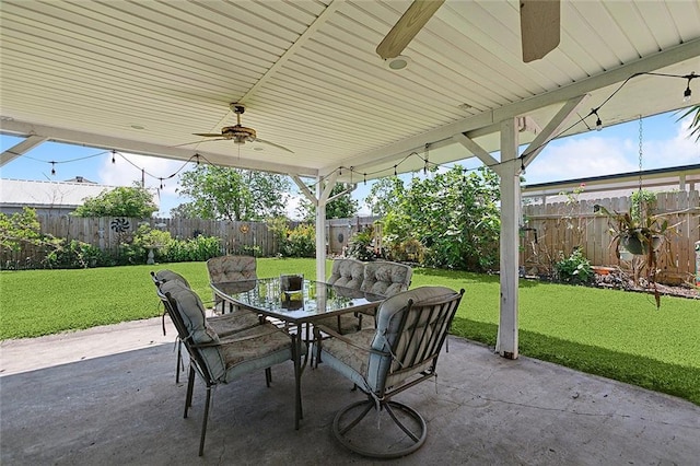 view of patio featuring a ceiling fan and outdoor dining space