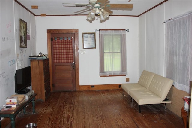 21508 Weinberger Rd, Ponchatoula, LA 70454 - living area with ornamental molding, wood finished floors, and ceiling fan