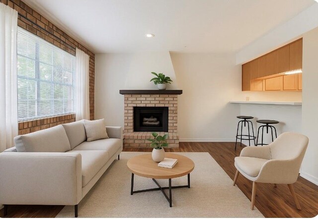 2305 Cleary Ave Unit 106, Metairie, LA 70001 - living area with wood finished floors, a fireplace, baseboards, and recessed lighting