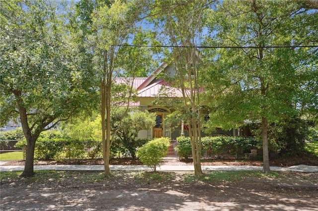 2334 Marengo St, New Orleans, LA 70115 - view of property hidden behind natural elements featuring fence