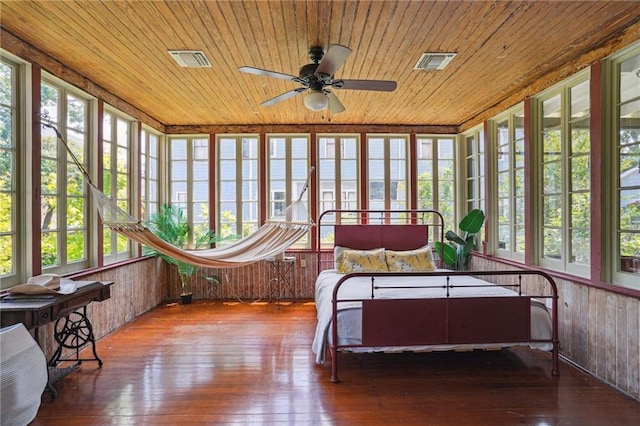 2334 Marengo St, New Orleans, LA 70115 - sunroom / solarium featuring wooden ceiling, wood walls, wood-type flooring, and french doors