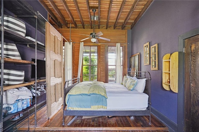 2334 Marengo St, New Orleans, LA 70115 - bedroom with wooden ceiling, wood-type flooring, baseboards, beamed ceiling, and wooden walls
