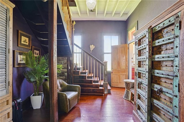 2334 Marengo St, New Orleans, LA 70115 - entrance foyer with stairs, wood-type flooring, and beam ceiling