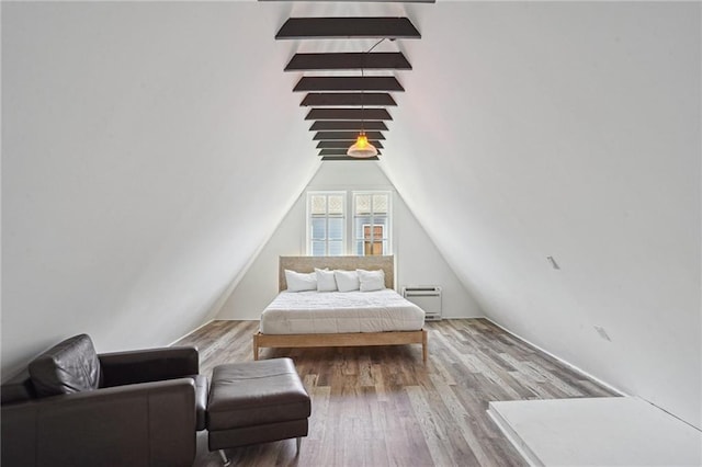 2334 Marengo St, New Orleans, LA 70115 - bedroom with wood finished floors and lofted ceiling