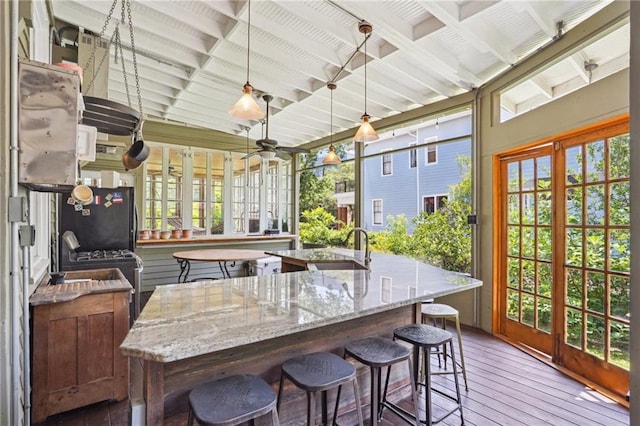 2334 Marengo St, New Orleans, LA 70115 - sunroom / solarium with french doors, a sink, and healthy amount of natural light