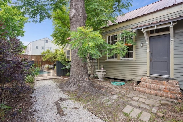 2334 Marengo St, New Orleans, LA 70115 - entrance to property with fence and metal roof