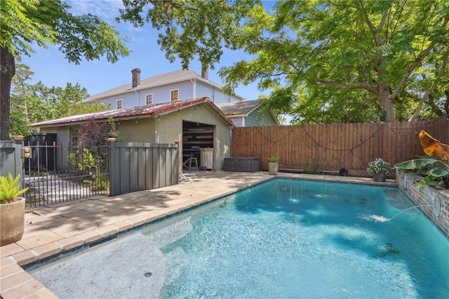 2334 Marengo St, New Orleans, LA 70115 - view of swimming pool with a fenced backyard and a patio