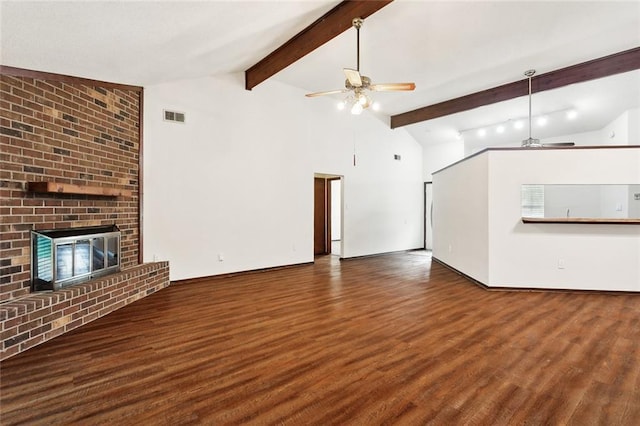 911 Forest Loop, Mandeville, LA 70471 - unfurnished living room with ceiling fan, wood finished floors, a fireplace, beamed ceiling, and baseboards