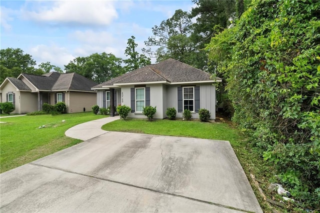 ranch-style house with a front lawn