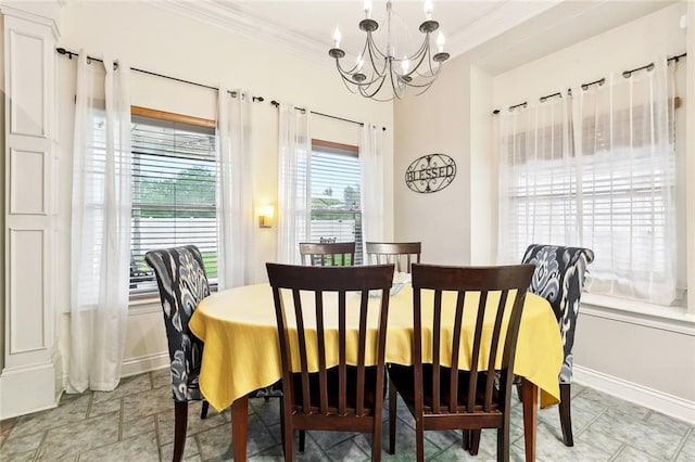 410 Doctor Gorman Dr, Belle Chasse, LA 70037 - dining room featuring a chandelier, ornamental molding, and baseboards