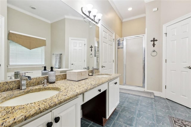 410 Doctor Gorman Dr, Belle Chasse, LA 70037 - full bathroom with a shower stall, double vanity, crown molding, and baseboards