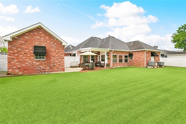 410 Doctor Gorman Dr, Belle Chasse, LA 70037 - rear view of house with brick siding, a patio area, and central AC