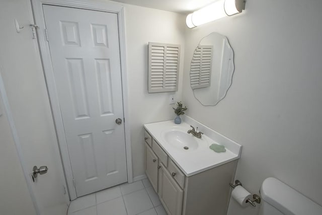 147 W Chamale Cv Unit 147, Slidell, LA 70460 - bathroom featuring vanity, toilet, and tile patterned floors