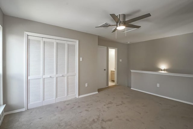 147 W Chamale Cv Unit 147, Slidell, LA 70460 - unfurnished bedroom featuring carpet floors, a closet, baseboards, and a ceiling fan