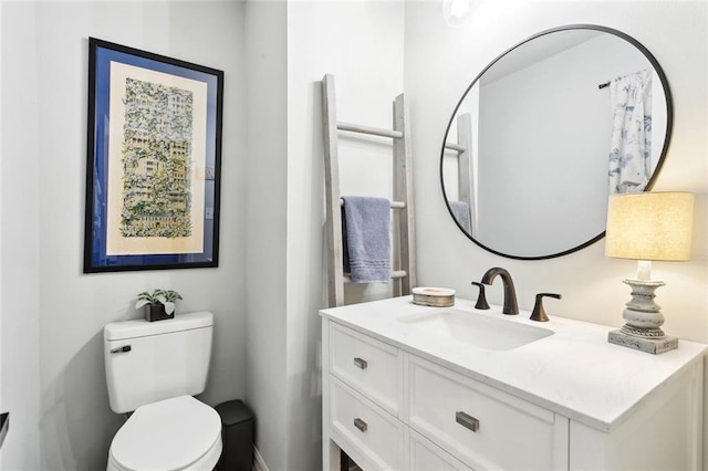 740 Heavens Dr Unit 8, Mandeville, LA 70471 - bathroom featuring toilet and vanity