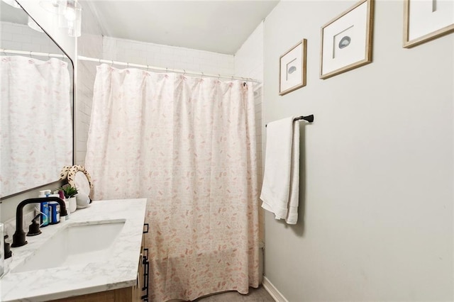 740 Heavens Dr Unit 8, Mandeville, LA 70471 - full bath featuring vanity, curtained shower, and baseboards