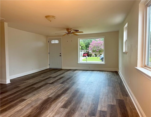 559 Resor Ave, Harahan, LA 70123 - unfurnished living room featuring dark wood-style floors and a ceiling fan