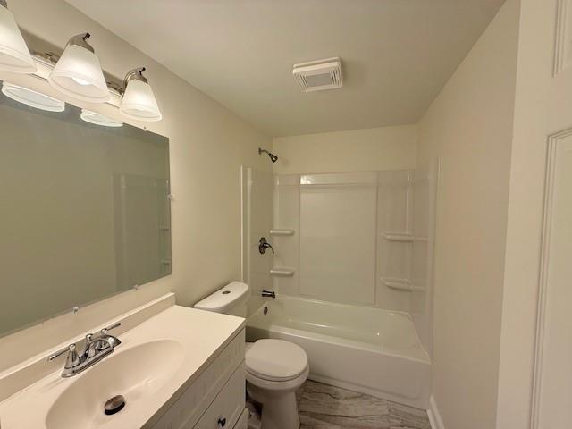 559 Resor Ave, Harahan, LA 70123 - full bath with vanity, bathtub / shower combination, and marble finish flooring