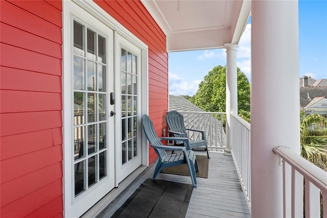 balcony featuring french doors