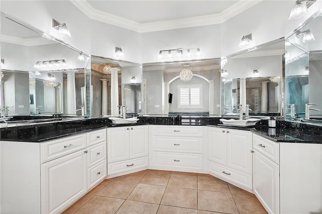 2283 Sunset Blvd, Slidell, LA 70461 - bathroom featuring tile patterned floors, ornate columns, ornamental molding, and vanity