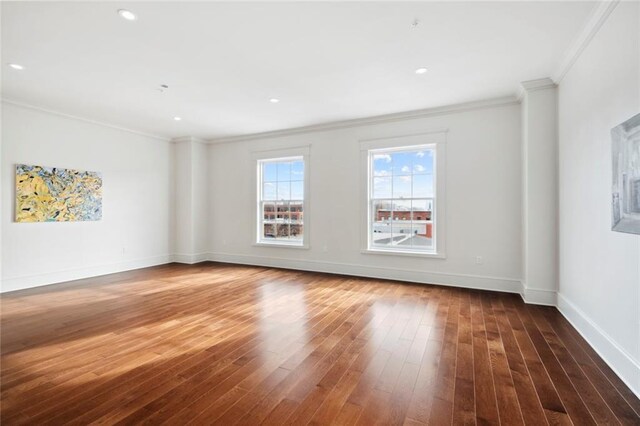 700 Magazine St Unit 513, New Orleans, LA 70130 - spare room with crown molding, hardwood / wood-style flooring, baseboards, and recessed lighting