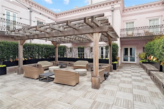 700 Magazine St Unit 513, New Orleans, LA 70130 - view of patio / terrace with an outdoor living space, a pergola, and french doors