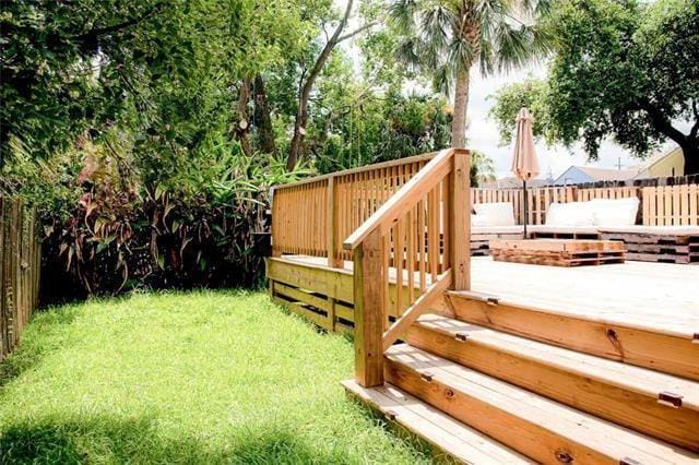 4226 S Carrollton Ave, New Orleans, LA 70119 - view of yard with a wooden deck