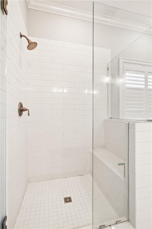 2021 Cypress Bend Dr, Madisonville, LA 70447 - bathroom featuring ornamental molding and a shower stall