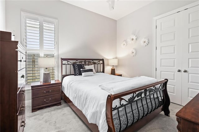 2021 Cypress Bend Dr, Madisonville, LA 70447 - bedroom featuring light carpet and a closet