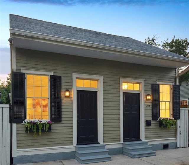 724 Port St, New Orleans, LA 70117 - view of front of home featuring entry steps and a shingled roof