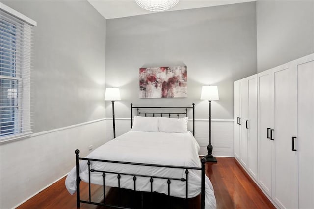 724 Port St, New Orleans, LA 70117 - bedroom featuring dark wood finished floors