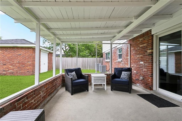 sunroom with beam ceiling