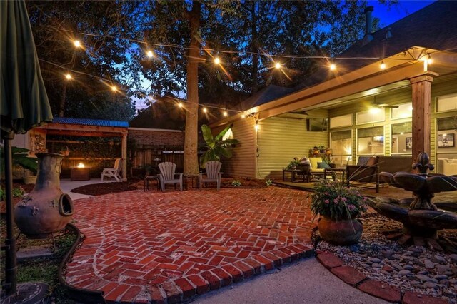 view of patio at twilight