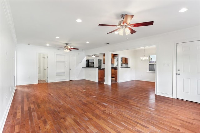 6415 Marshal Foch St, New Orleans, LA 70124 - unfurnished living room with a ceiling fan, ornamental molding, a chandelier, recessed lighting, and baseboards