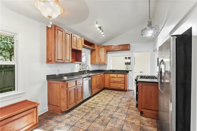 6415 Marshal Foch St, New Orleans, LA 70124 - kitchen featuring appliances with stainless steel finishes, lofted ceiling, a sink, dark countertops, and baseboards