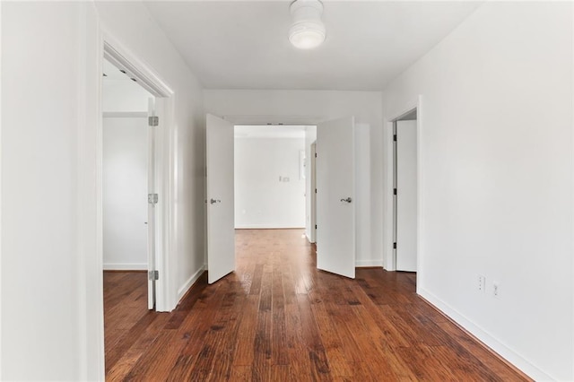 6415 Marshal Foch St, New Orleans, LA 70124 - corridor featuring dark wood-style flooring and baseboards