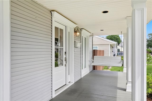 view of patio featuring a porch
