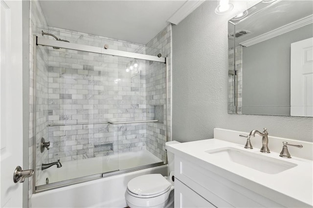 320 Wainwright Dr, Harahan, LA 70123 - full bath with vanity, shower / bath combination with glass door, a textured wall, and crown molding