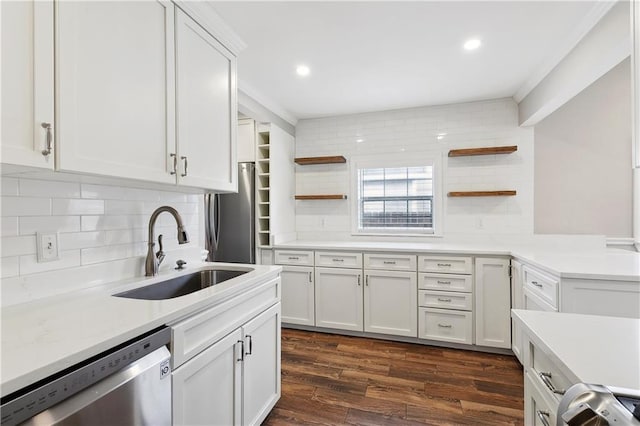 320 Wainwright Dr, Harahan, LA 70123 - kitchen with appliances with stainless steel finishes, open shelves, backsplash, light countertops, and recessed lighting