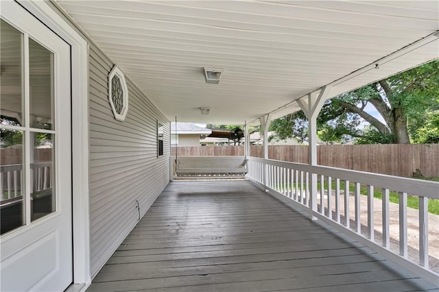 deck featuring fence