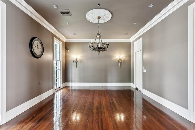 54 Beresford Dr, Metairie, LA 70001 - unfurnished dining area featuring a chandelier, hardwood / wood-style flooring, ornamental molding, and baseboards