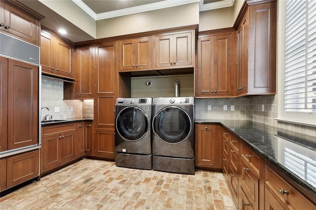 54 Beresford Dr, Metairie, LA 70001 - laundry area with brick patterned flooring, crown molding, separate washer and dryer, and cabinet space