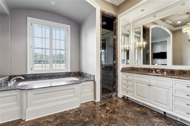 54 Beresford Dr, Metairie, LA 70001 - full bath with marble tiled floors, vanity, a bath, a stall shower, and ornamental molding