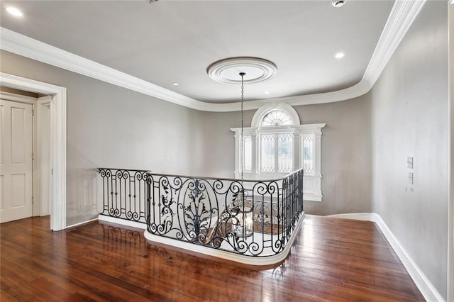 54 Beresford Dr, Metairie, LA 70001 - hallway with crown molding, baseboards, an upstairs landing, wood finished floors, and recessed lighting