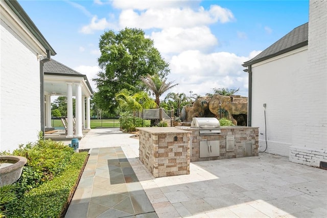 54 Beresford Dr, Metairie, LA 70001 - view of patio featuring area for grilling and a grill