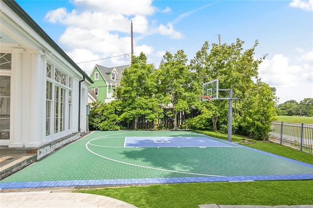 54 Beresford Dr, Metairie, LA 70001 - view of sport court featuring fence and basketball hoop