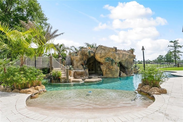 54 Beresford Dr, Metairie, LA 70001 - view of property's community featuring a pool and fence