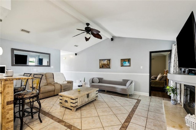 2930 Laurie Ln, Marrero, LA 70072 - living room with light tile patterned floors, ceiling fan, inlaid floor details, and baseboards
