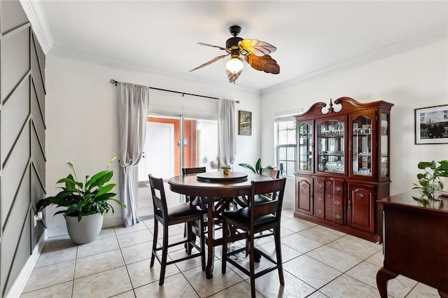 2930 Laurie Ln, Marrero, LA 70072 - dining space with ceiling fan, crown molding, and light tile patterned floors