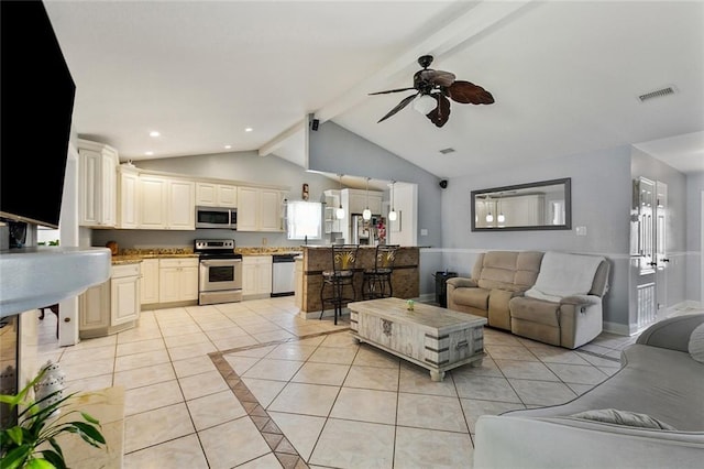 2930 Laurie Ln, Marrero, LA 70072 - living room featuring light tile patterned flooring, ceiling fan, healthy amount of natural light, and recessed lighting